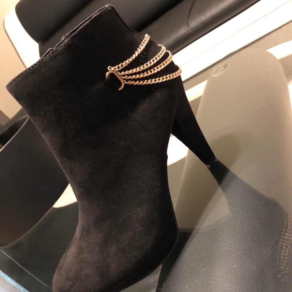 Brand new black suede boots with gold chain.